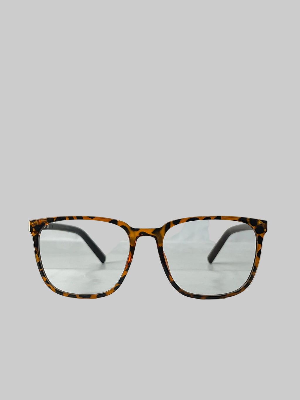 Tortoiseshell-framed eyeglasses on a white background
